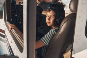 child inside airplane